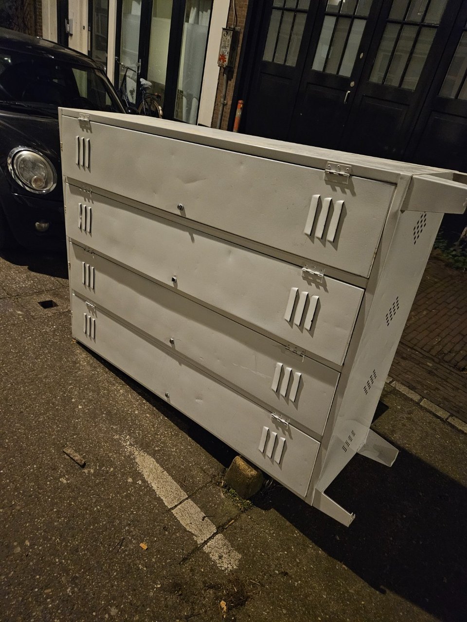 White locker cabinet in good condition. Heavy.