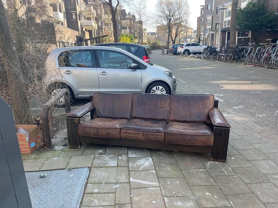 Danish design couch. Needs some love, a couple of damaged couch pillows and some wear and tare on the wood.