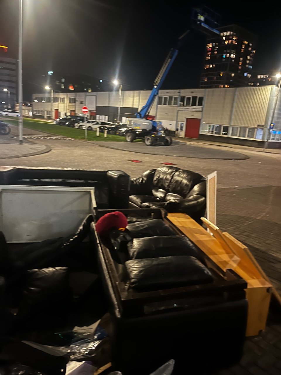 Multiple black leather couches