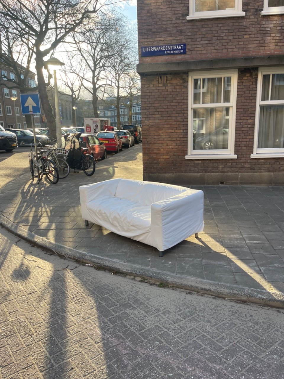 White couch, a bit dirty but I think it could be washed easily