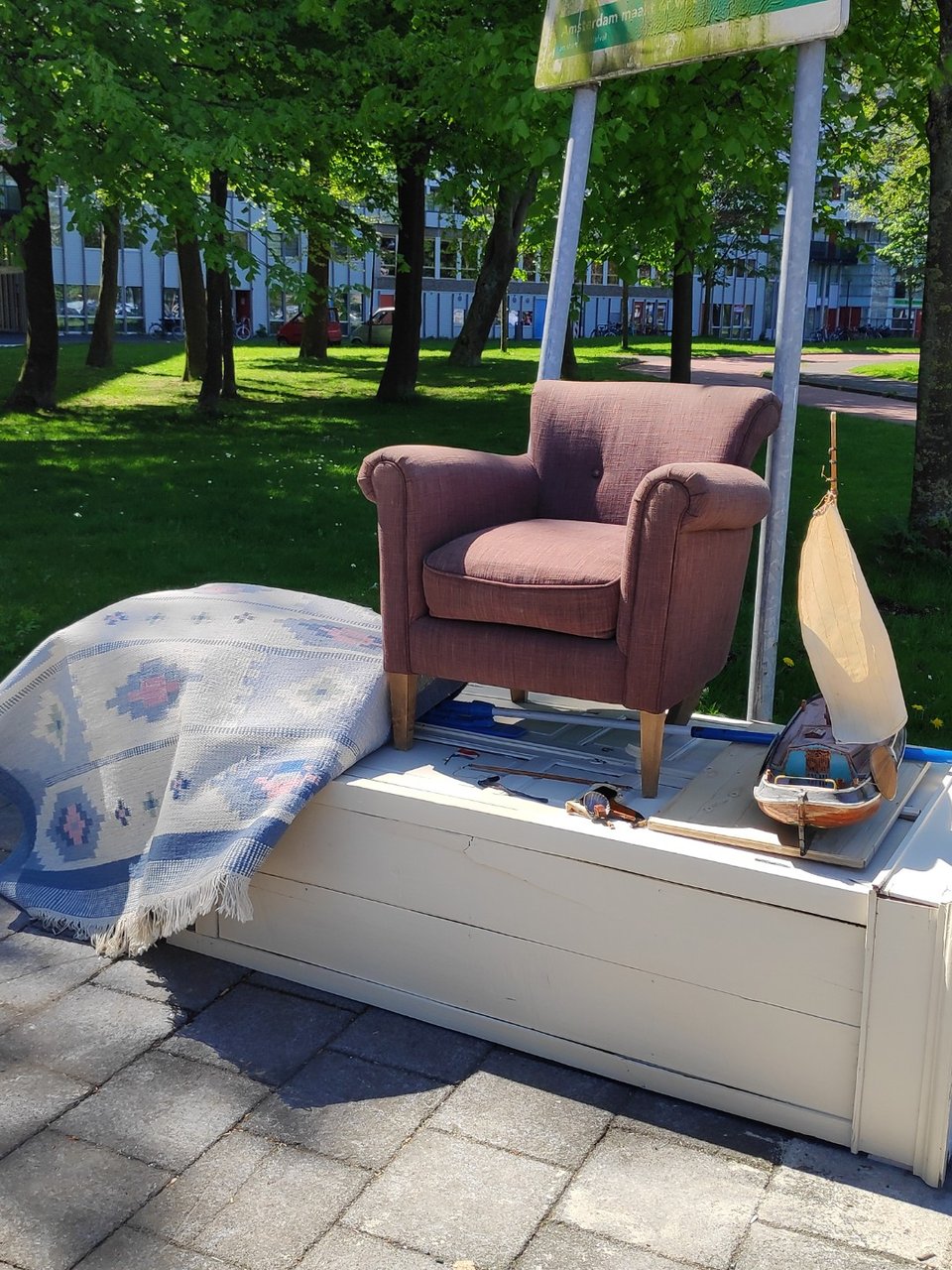 Couch, carpet and boat model