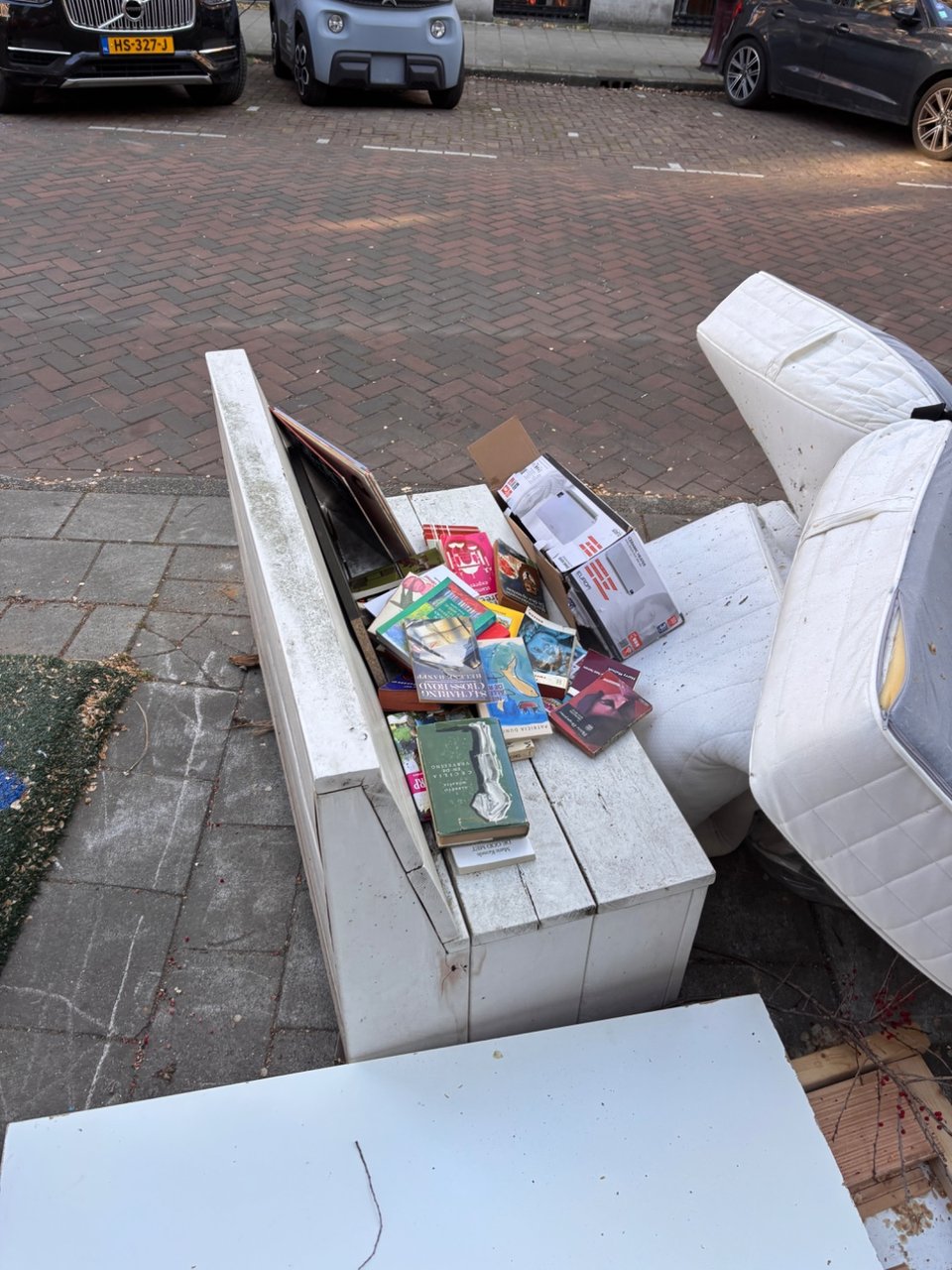 Wooden bench and Vinyl records and books.