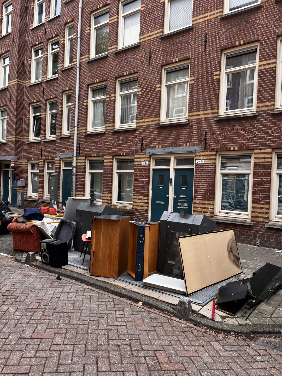 Speakers, couch, blue drawer