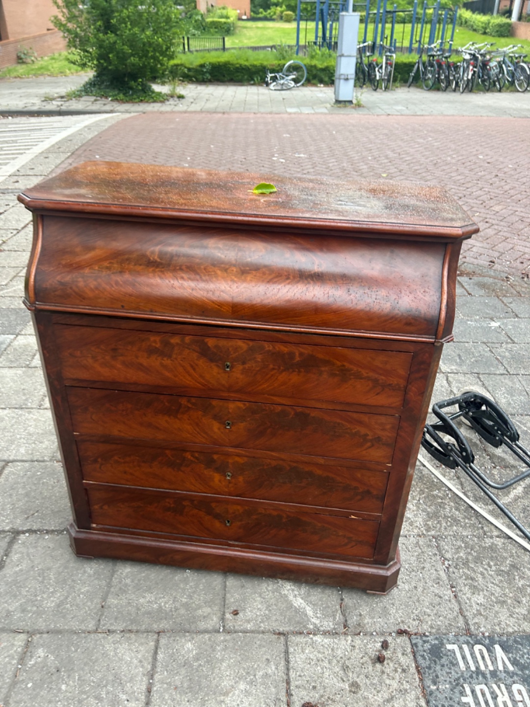 gorgeous wood. she is getting rained on and idk about the state of the inside.