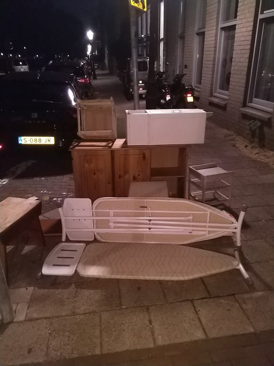 cupboard ironing board and a few other stuff