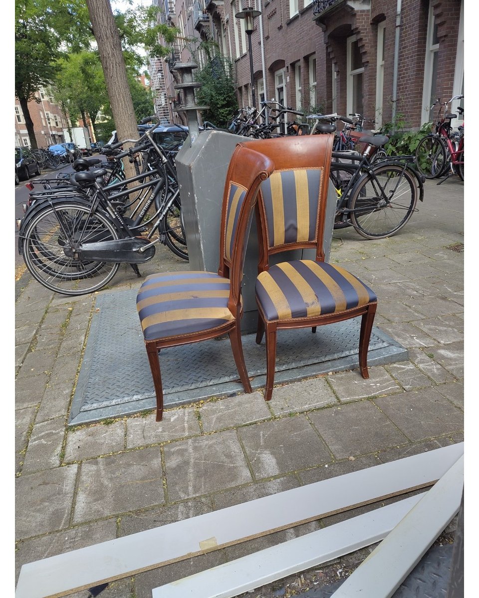 Two chairs, good quality but the seat fabric has small rips