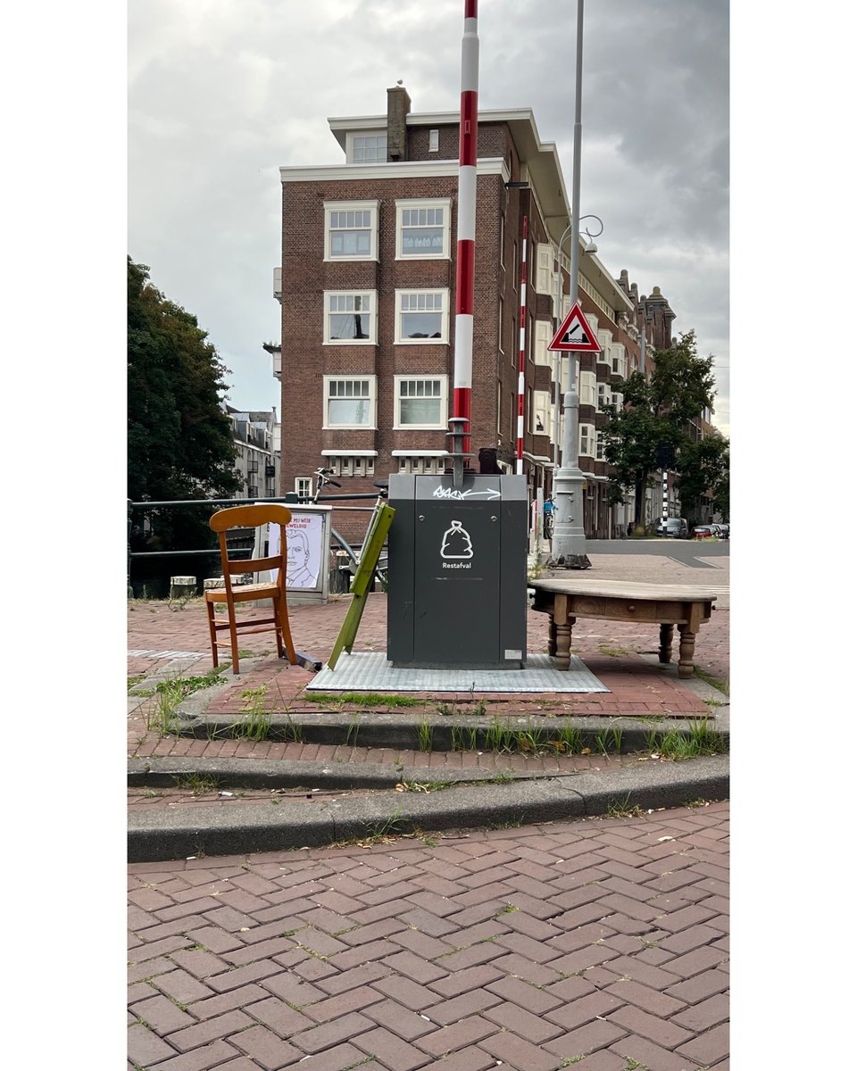 The round table is proper wood. Solid and heavy. Just needs some sanding and oiling.