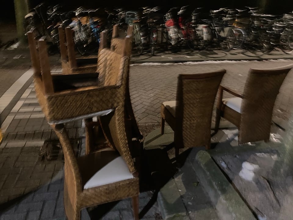 Six dining room chairs, some with arm rests. 
They might’ve spent some time in the rain I think.