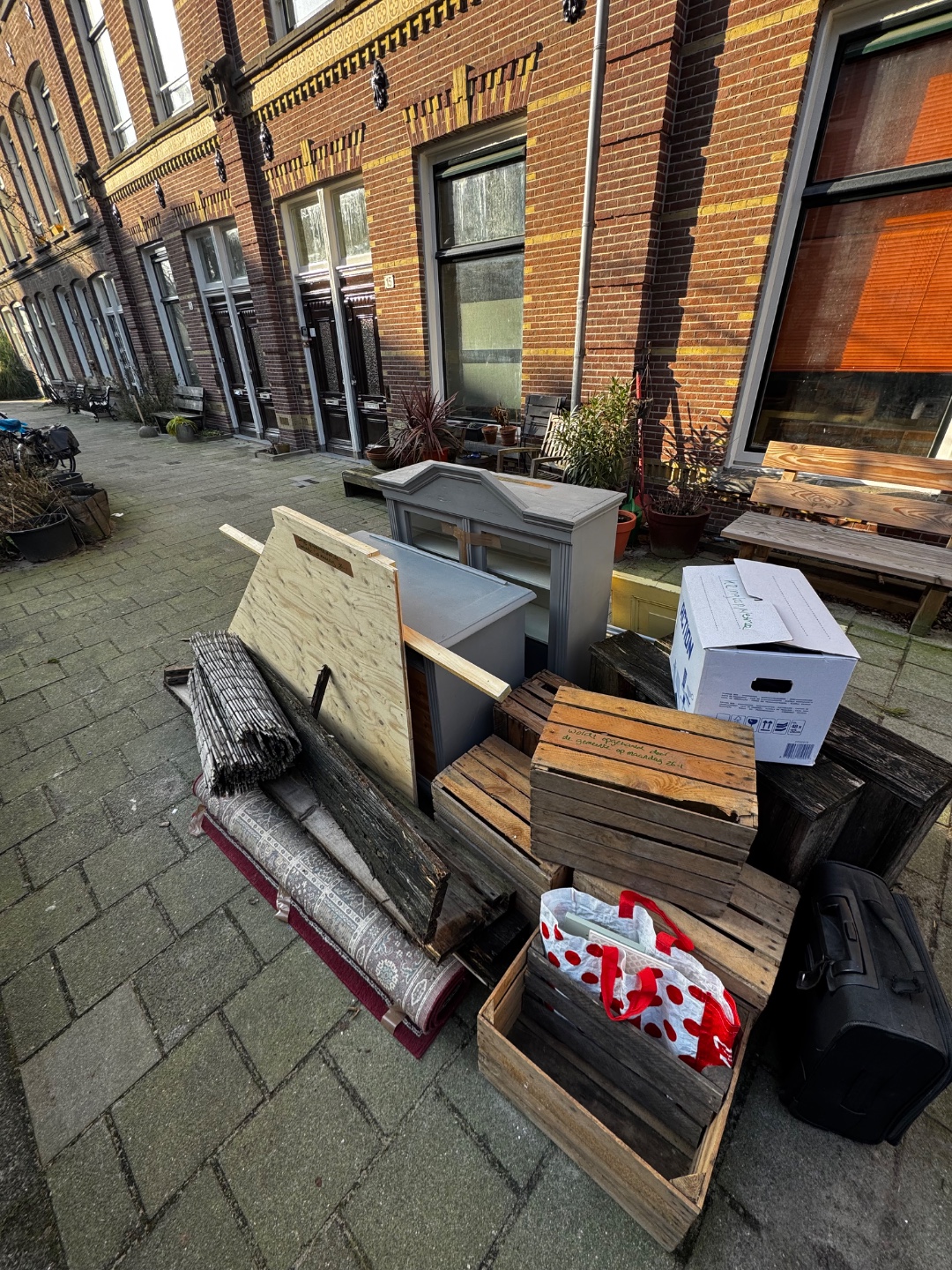 Wooden boxes as shelf’s, door, laundry rack, cupboard.