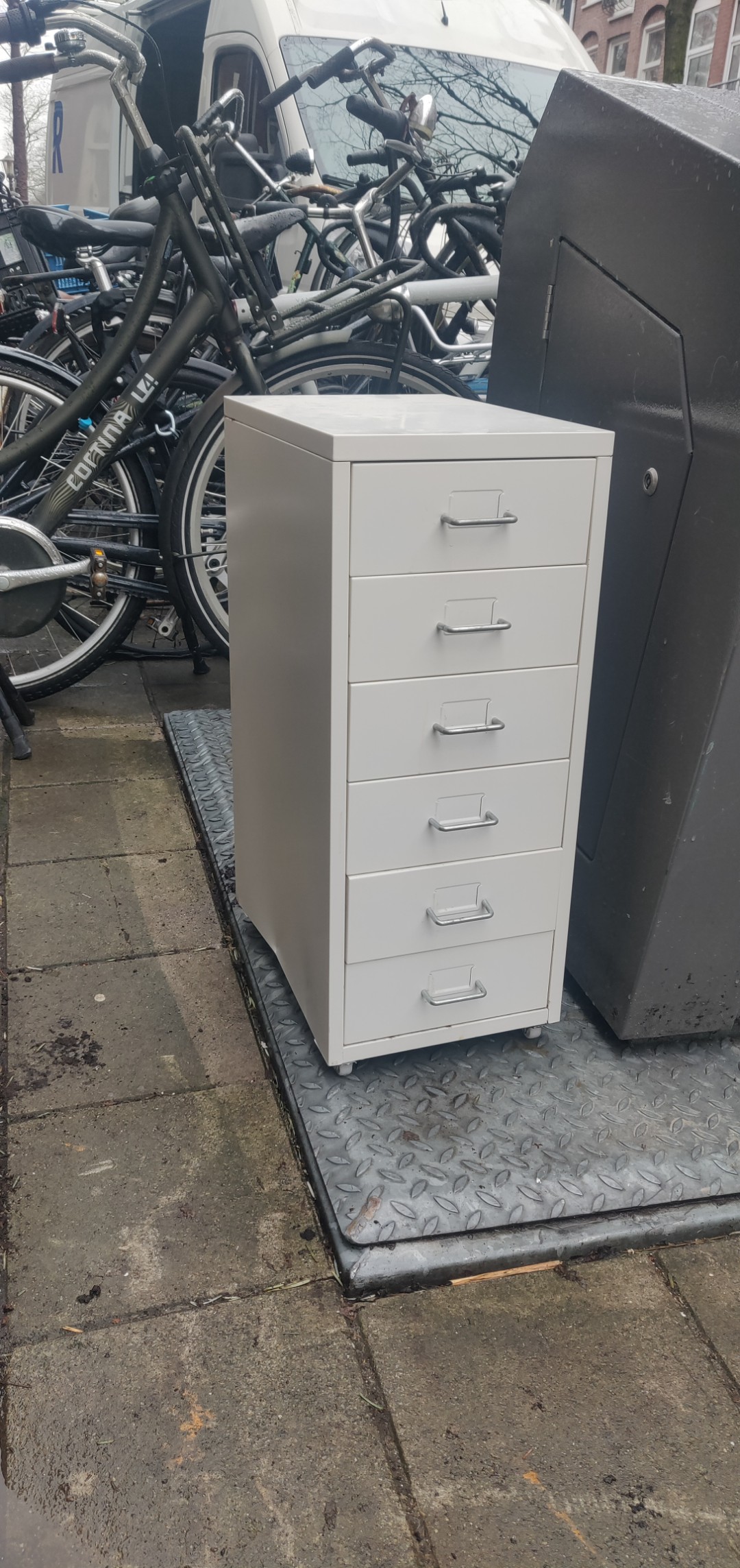 Chest of drawers. Has a dent in the side and small signs of rust, but looks overall still usable.