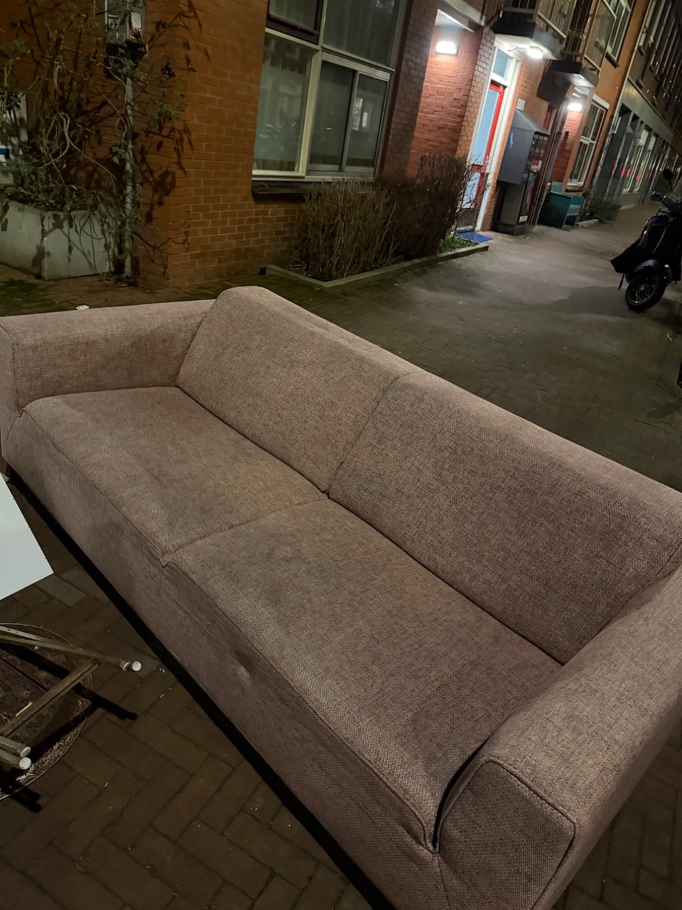 My old couch! Is more comfortable than it looks. Is still in good shape! Just put it outside a few minutes ago.