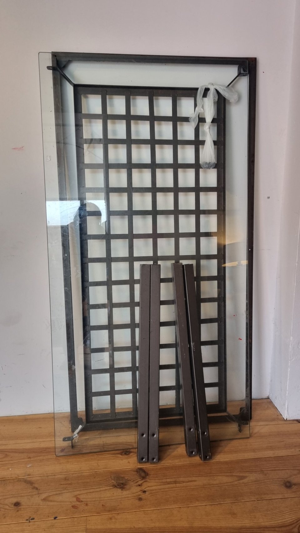 Big and heavy coffee table from glass and steal (or iron?). Pick up at sijsjesstraat 21b. App me if you are interested