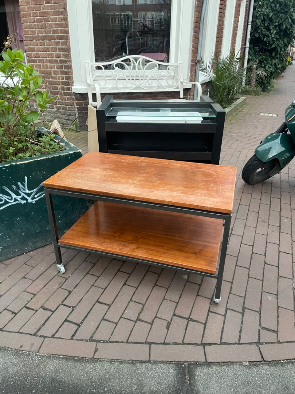 Beautiful minimalistic coffee table/tv furniture. If you basically sand it and put a layer of wood protection on it you can use it perfectly