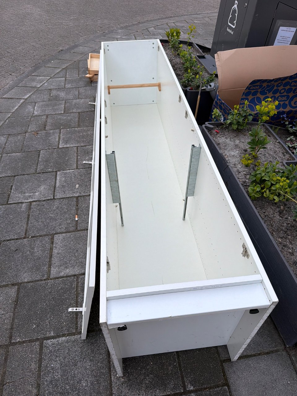 Wardrobe with hanging rail and door