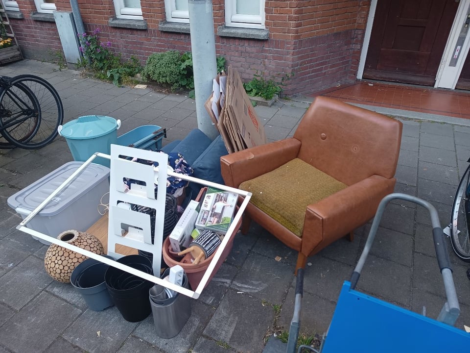 Chair, moving boxes, cat supplies, miscellany