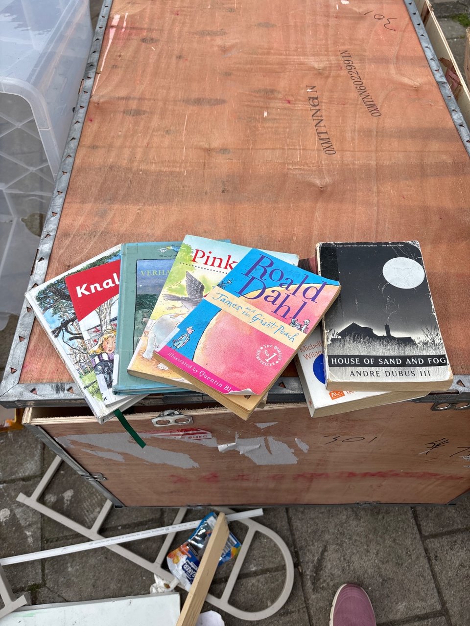 Five kid's books, two adult books (I think?). In OK condition.