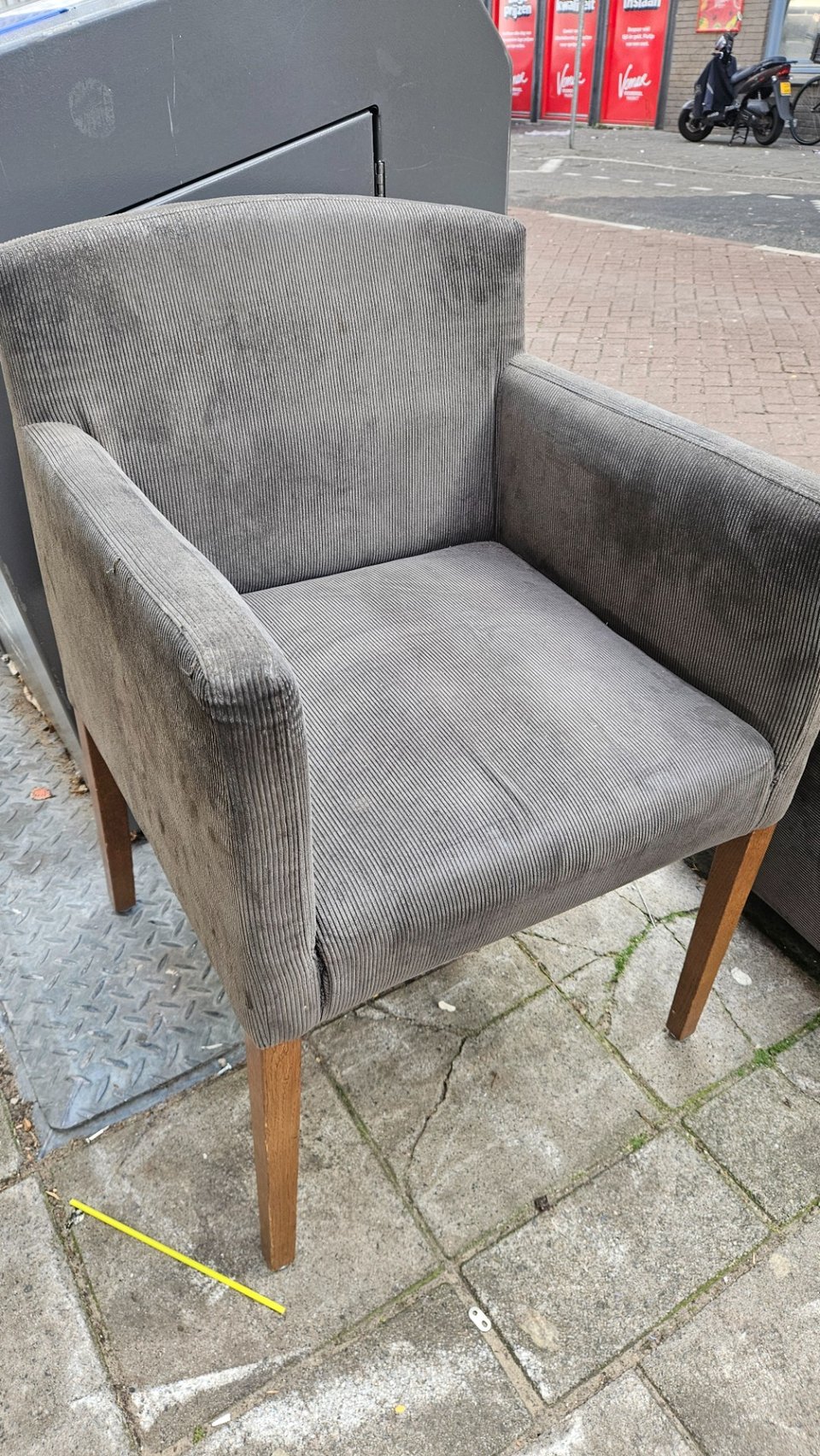 Arm chair. There is a second one with 2 missing legs.